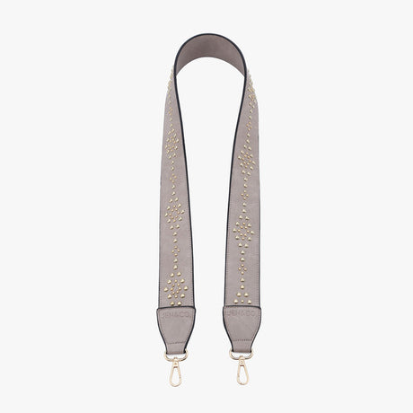 Gray bag strap with gold studs and gold hardware on a white background