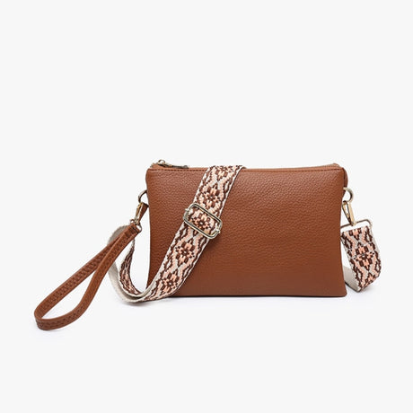 Brown handbag with a print print strap on a white background