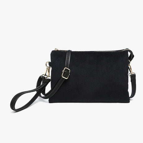 Black corduroy crossbody bag with a strap on a white background