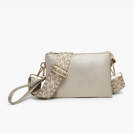 Gold handbag with lace detailing on a white background