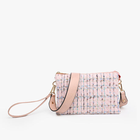 Pink tweed handbag with a strap on a white background