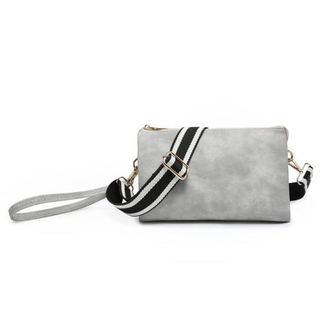 Gray clutch bag with a black and white striped strap on a white background