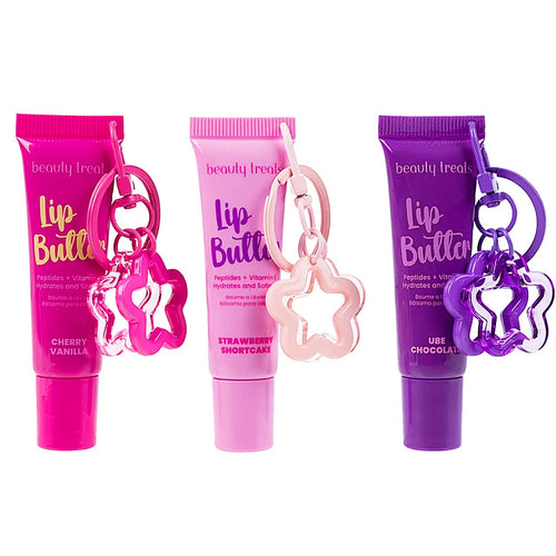Three Beauty Treat Lip Butter tubes in pink and purple with matching star-shaped keychains, shown on a white background. The tubes are labeled Cherry Vanilla, Strawberry Shortcake, and Urf Chocolate.