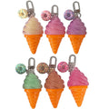 Six ice cream cone keychains arranged in two rows of three on a plain white background. Each keychain has a metal clasp and a small donut charm.