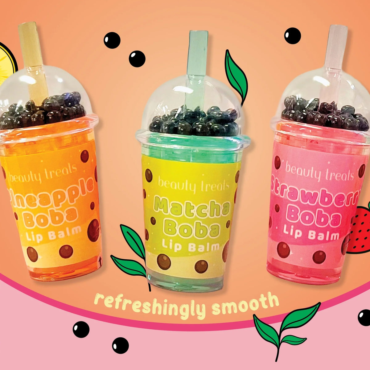 Three colorful lip balm cups filled with black boba pearls, labeled Apple Boba, Matcha Boba, and Strawberry Boba, on a peach background with decorative leaves and dots.