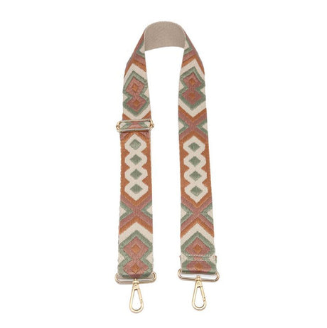 Patterned bag strap with gold hardware on a white background