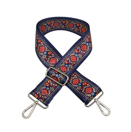 Floral patterned bag strap on a white background