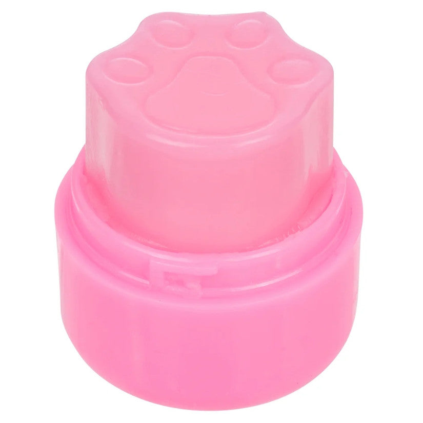 Beauty Treats Bunny Lip Balm Keychain showing paw print imprint on the top of balm