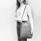 Image of Cora Backpack worn on the side as a crossbody.