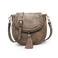 Clay vegan leather crossbody bag with braided details and a tassel on a white background