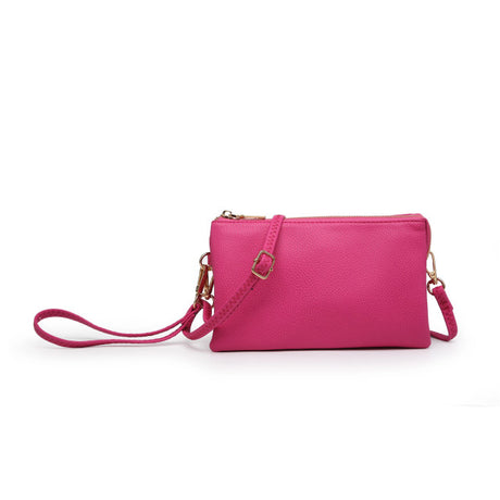 Pink handbag with a strap on a white background