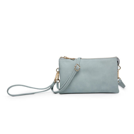 Light blue handbag with a strap on a white background