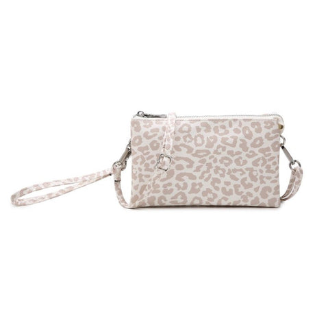 Nude cheetah print handbag with a strap on a white background
