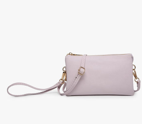 Cool pink handbag with a strap on a white background