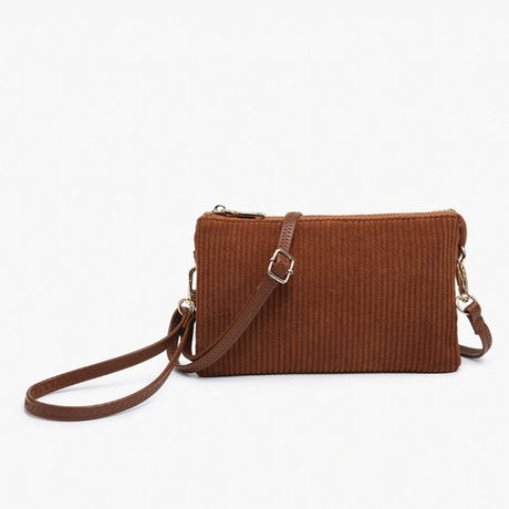 Brown corduroy handbag with a strap on a white background