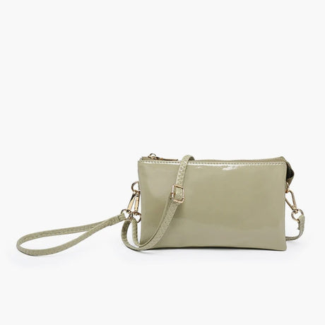 Light green handbag with a strap on a white background