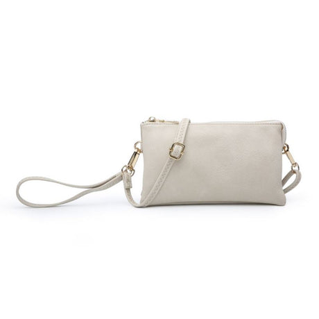 Ivory handbag with a strap on a white background