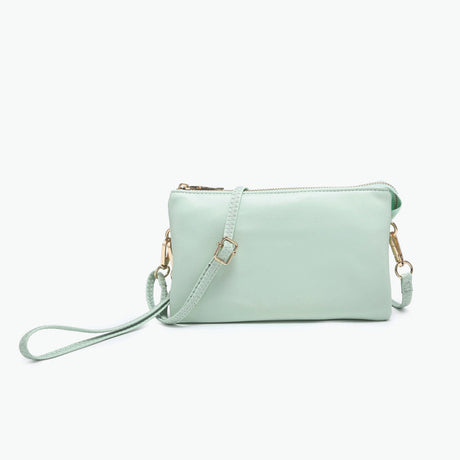 Riley Light Mint green handbag with a strap on a white background