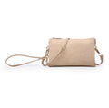 Light Peach handbag with a strap on a white background