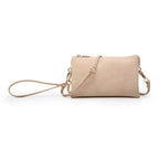 Light Peach handbag with a strap on a white background
