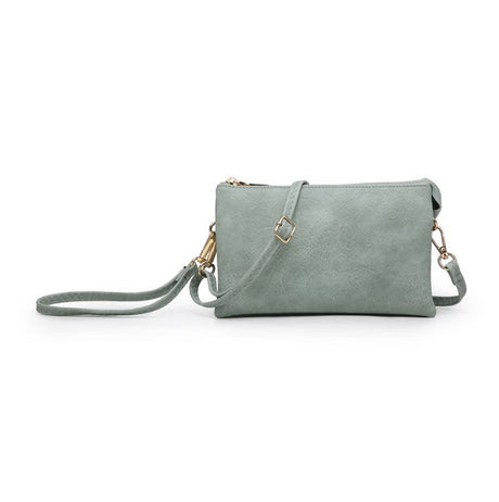 Light teal handbag with a strap on a white background