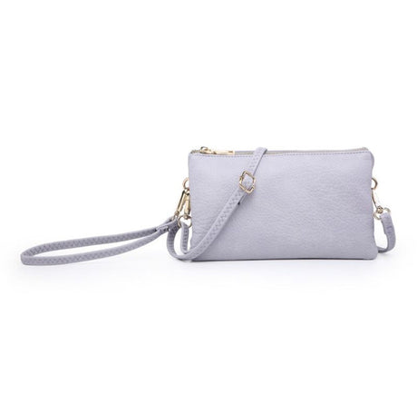 Lilac clutch bag with a strap on a white background