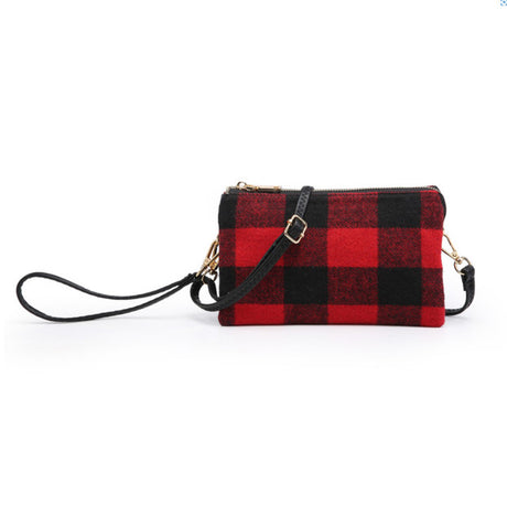 Red and black plaid clutch bag with a strap on a white background