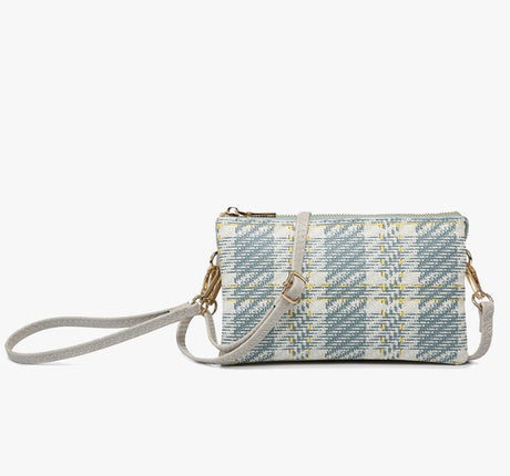Plaid Teal handbag with a strap on a white background