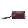 Plum crossbody bag on a white background