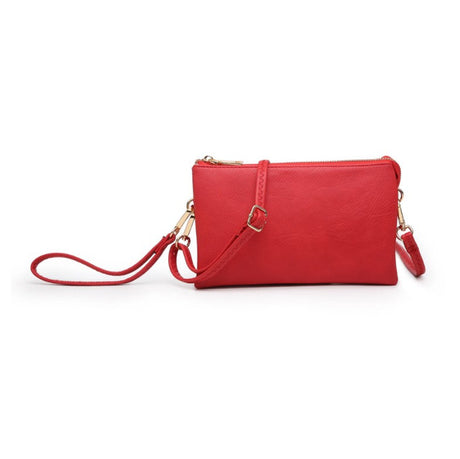 Red handbag with a strap on a white background