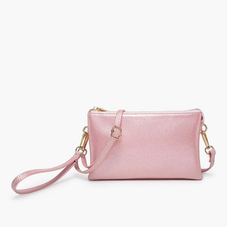 Pink rose quartz handbag with a strap on a white background