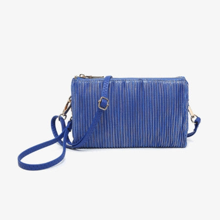 Riley Shimmer Stripe Royal Bluehandbag with a strap on a white background
