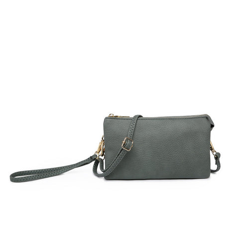 Slate colored handbag with a strap on a white background