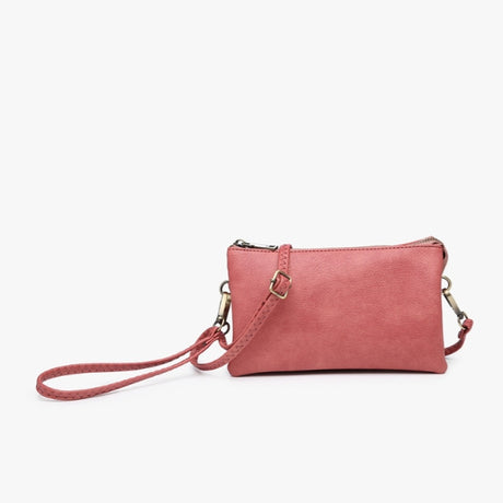 Terracotta crossbody bag with a strap on a white background