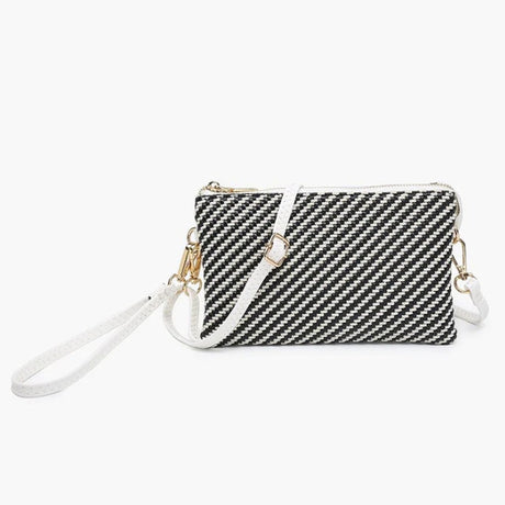 Black and white striped clutch with a white strap on a white background