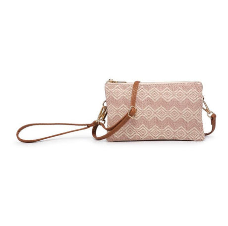 Woven handbag with brown strap on a white background