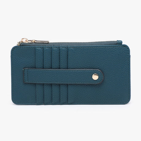 A teal blue pebbled leather zip-around wallet with card slots, a front strap closure, and gold-tone hardware, shown against a plain white background.