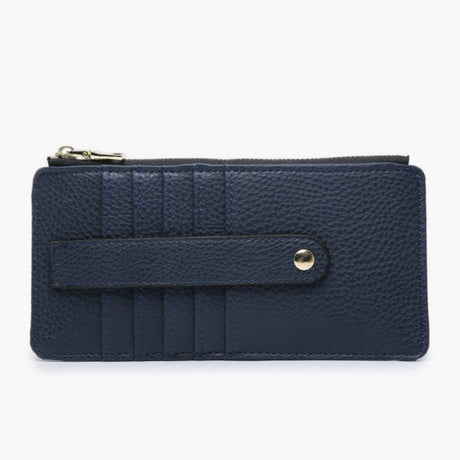 A navy blue pebbled leather zip-around wallet with a front strap closure and gold-tone metal snap button, shown on a plain white background.