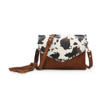 Jen & Co Sloane Flapover Crossbody  in cow print