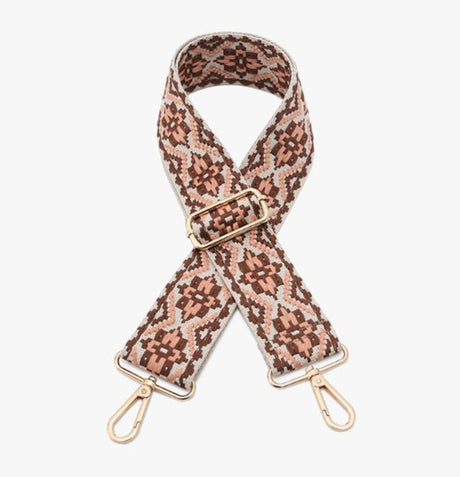 Leopard print bag strap with gold hardware on a white background